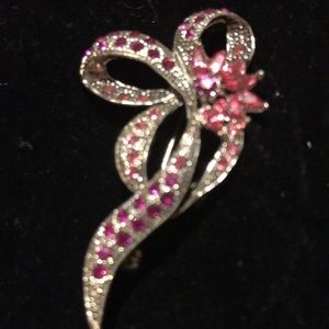 Express pink brooch